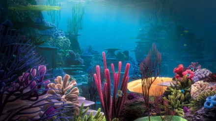 A vibrant underwater scene from the movie Finding Nemo, featuring colorful coral and marine life, suitable as an HD desktop wallpaper or background.