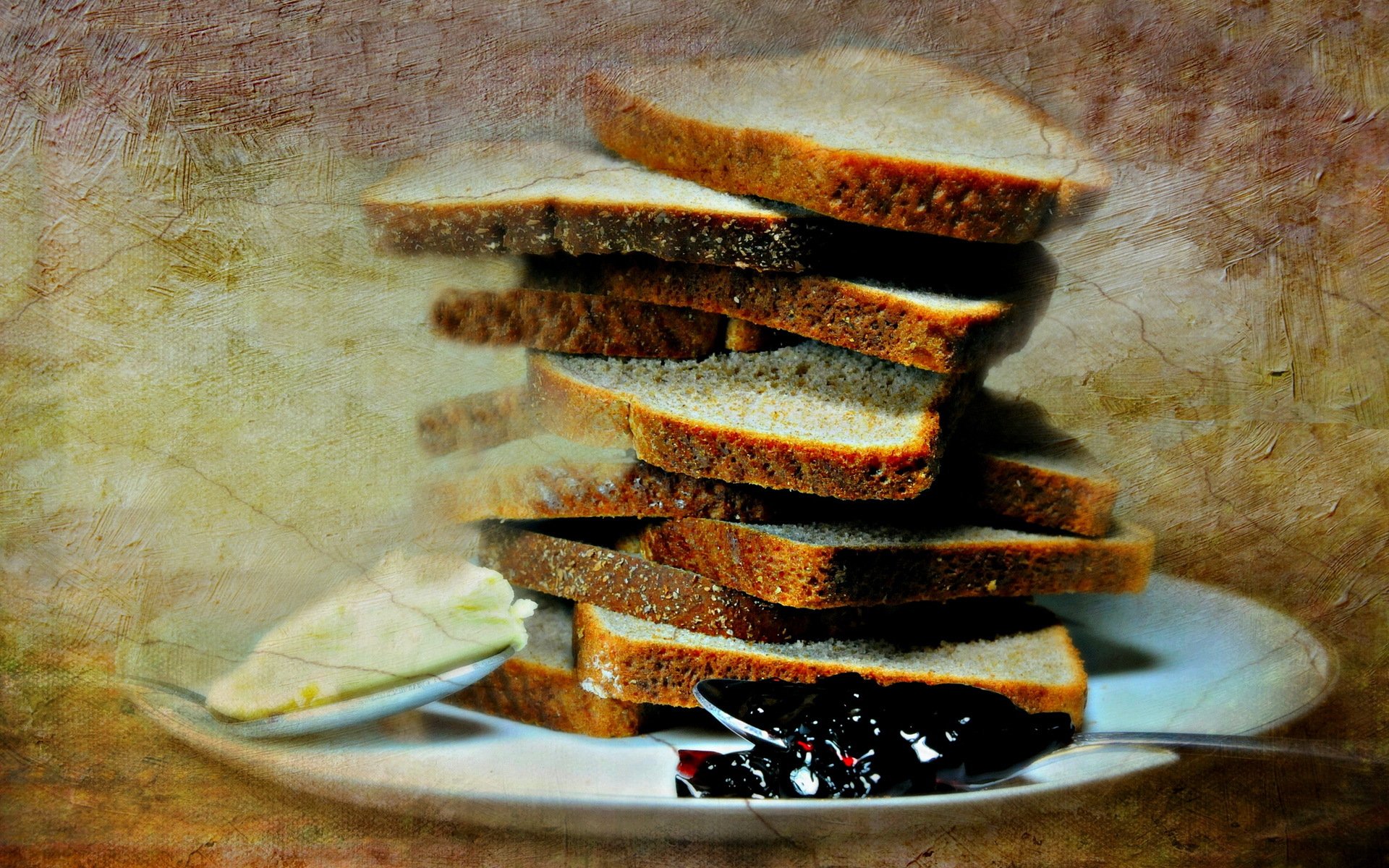 HD PC desktop wallpaper/background of stacked sliced bread on a plate with butter and jam, rustic textured backdrop, food photography.