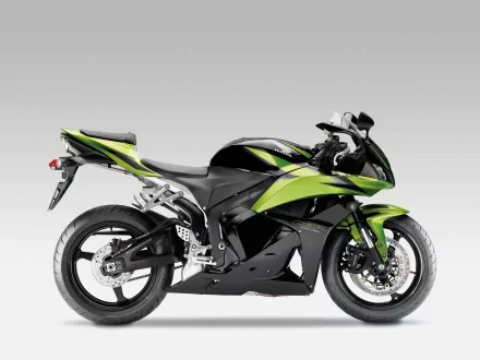 HD PC desktop wallpaper featuring a Honda CBR600RR motorcycle in black and green, showcasing the sleek design of this Honda bike and vehicle.