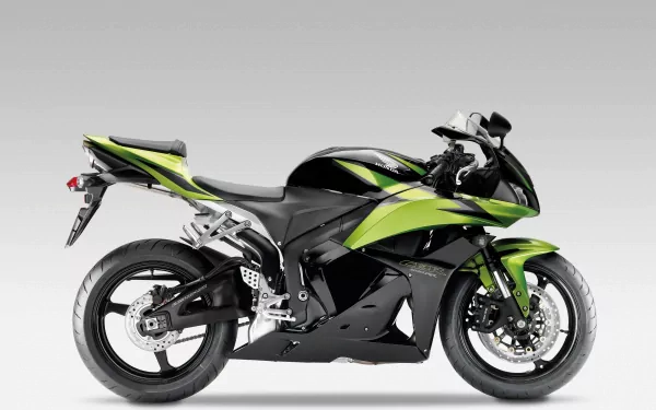 HD PC desktop wallpaper featuring a Honda CBR600RR motorcycle in black and green, showcasing the sleek design of this Honda bike and vehicle.