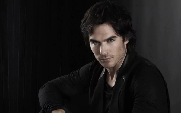 HD desktop wallpaper featuring celebrity Ian Somerhalder posing against a dark background, exuding a confident and serious expression.