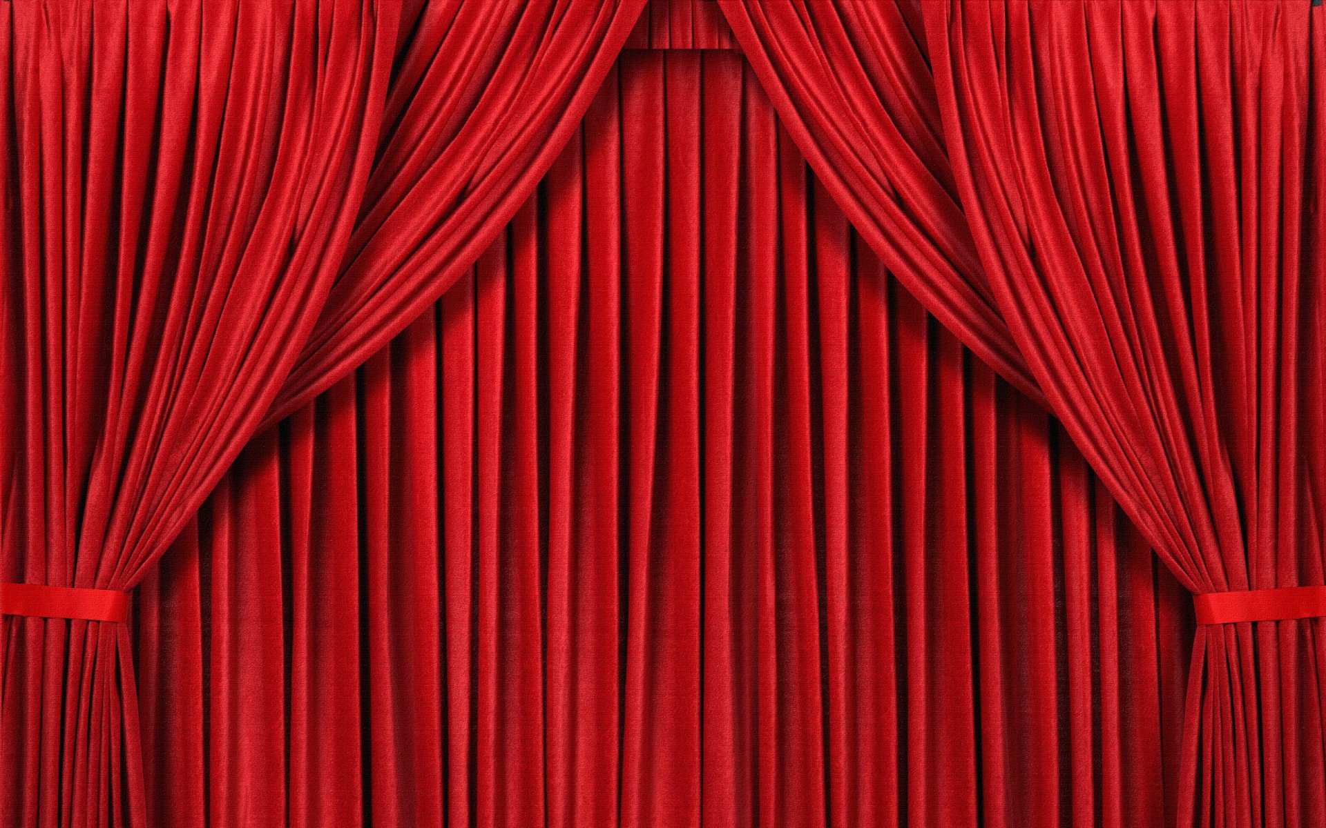 An abstract HD desktop wallpaper featuring rich red curtains with elegant folds, creating a dramatic and vibrant background for any computer screen.