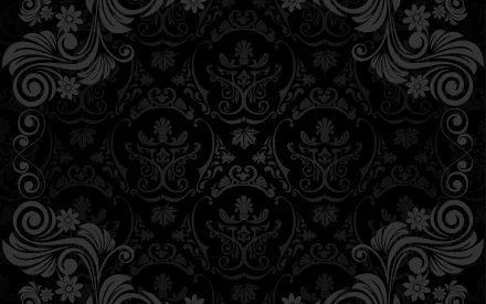 Abstract black and dark gray floral pattern with intricate swirls and designs, serving as a striking HD PC desktop wallpaper and background.