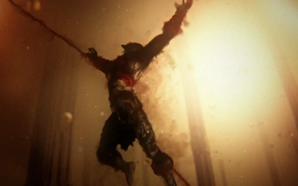 Kratos silhouette clutching chained blades, leaping through dust and golden light — God of War: Ascension HD PC desktop wallpaper/background.