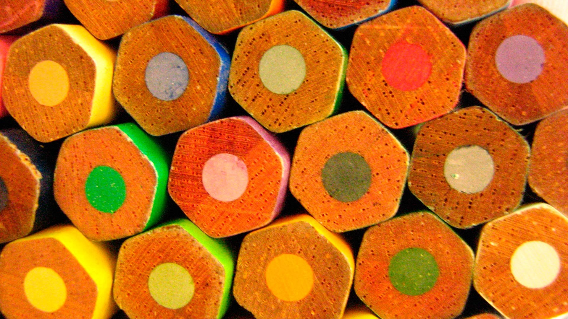 Photography of colorful pencil ends arranged in a tight mosaic — vivid HD PC desktop wallpaper and background.