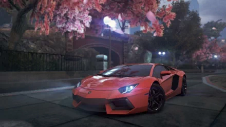 A vibrant orange Lamborghini Aventador showcased in a detailed scene from Need For Speed: Most Wanted, surrounded by blooming cherry blossom trees in a lively urban setting.