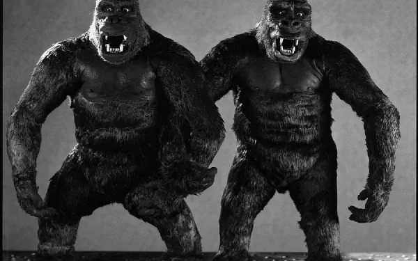A striking HD wallpaper featuring King Kong figures from the classic 1933 film, showcasing the iconic giant gorilla in an expressive and dynamic pose.