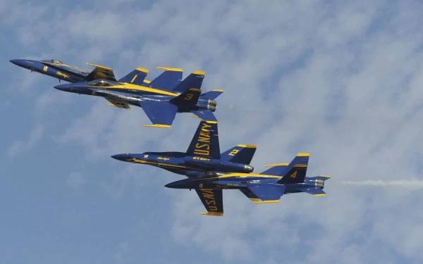 Two McDonnell Douglas F/A-18 Hornet Blue Angels jets in tight formation over clouds, navy military aircraft at an air show — 2K Quad HD PC desktop wallpaper.