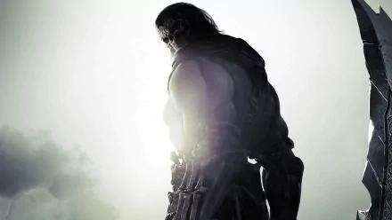 HD PC desktop wallpaper featuring a dark, silhouetted character from the video game Darksiders II against a bright, misty background.