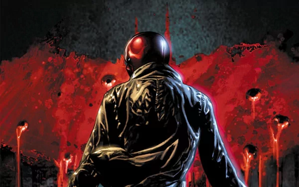 Comic-style HD PC desktop wallpaper of Red Hood And The Outlaws: red-helmeted vigilante in a leather jacket seen from behind against a blood-red, splattered urban backdrop.