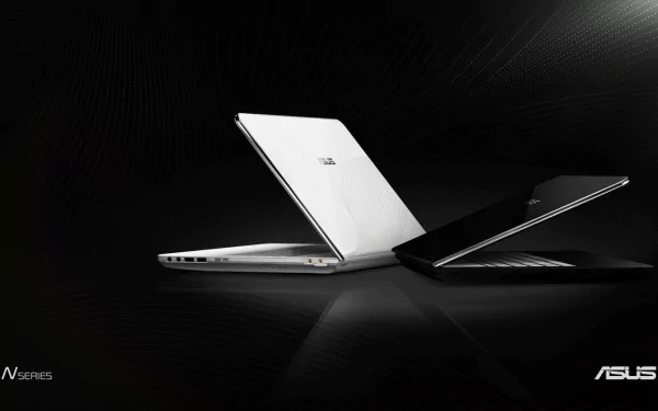 Technology-themed HD PC desktop wallpaper and background showing two Asus laptops, one white and one black, positioned back-to-back on a sleek black surface.