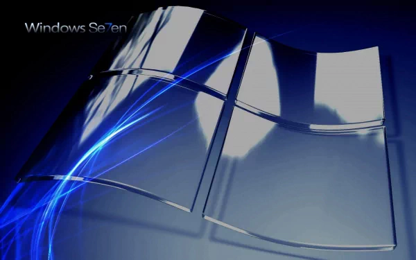 HD desktop wallpaper featuring a sleek, reflective Windows 7 logo with dynamic blue light streaks on a dark background, highlighting technology and the Windows 7 theme.