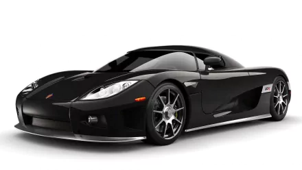 A sleek black Koenigsegg CCX showcases its aerodynamic design, highlighted against a clean background, serving as an eye-catching HD desktop wallpaper.