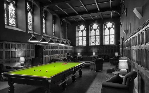 HD PC desktop wallpaper featuring a man-made pool game table in an elegant, vintage room with stained glass windows and classic wooden paneling.