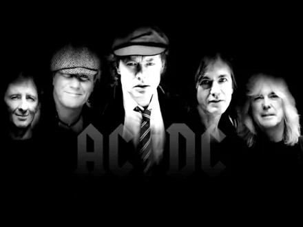 A striking HD wallpaper featuring the iconic band AC/DC, showcasing Angus Young and fellow members against a dark backdrop, emphasizing their powerful presence in music.