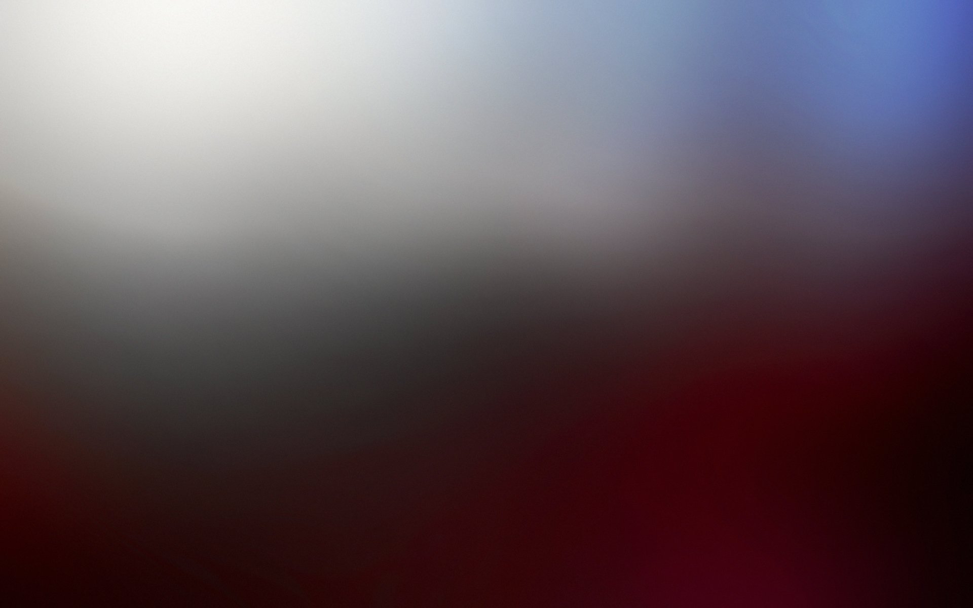 A high-definition abstract wallpaper featuring a blurred mix of colors, creating a soft and tranquil background.
