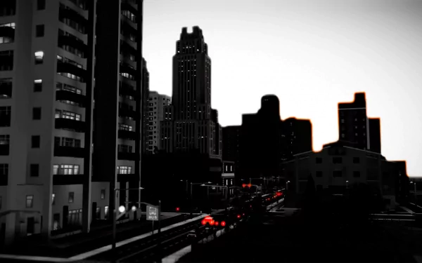 HD wallpaper of a SimCity-inspired cityscape at dusk with silhouetted buildings and street lights.