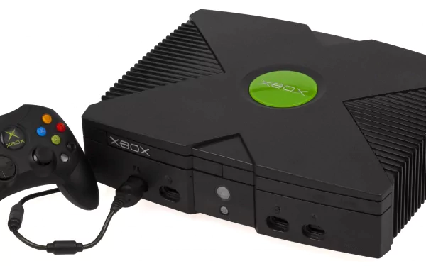 HD PC desktop wallpaper featuring a classic Xbox console and controller, highlighting the iconic design of the original video game system.