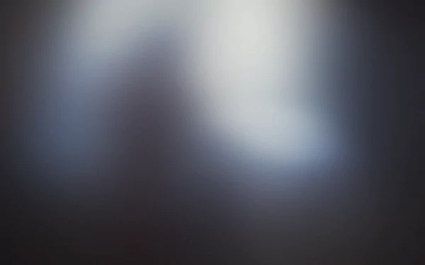 An abstract, blurred HD desktop wallpaper featuring soft gradients of light and dark tones, creating a serene and minimalist background.
