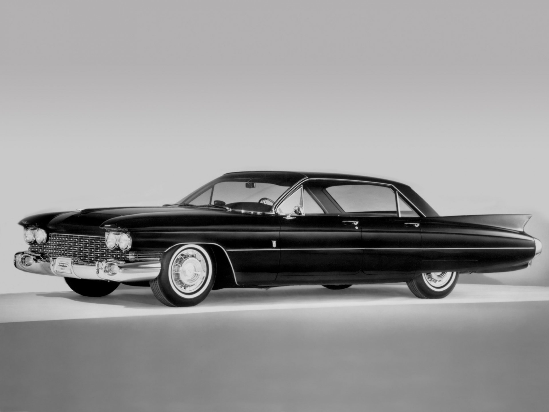 HD desktop wallpaper featuring a classic 1959 Cadillac Eldorado Brougham in sleek black, showcasing its iconic vintage design and luxurious silhouette.