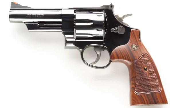 A sleek Smith & Wesson revolver with a polished silver finish and wooden grip, set against a clean background, serving as an engaging HD PC desktop wallpaper.