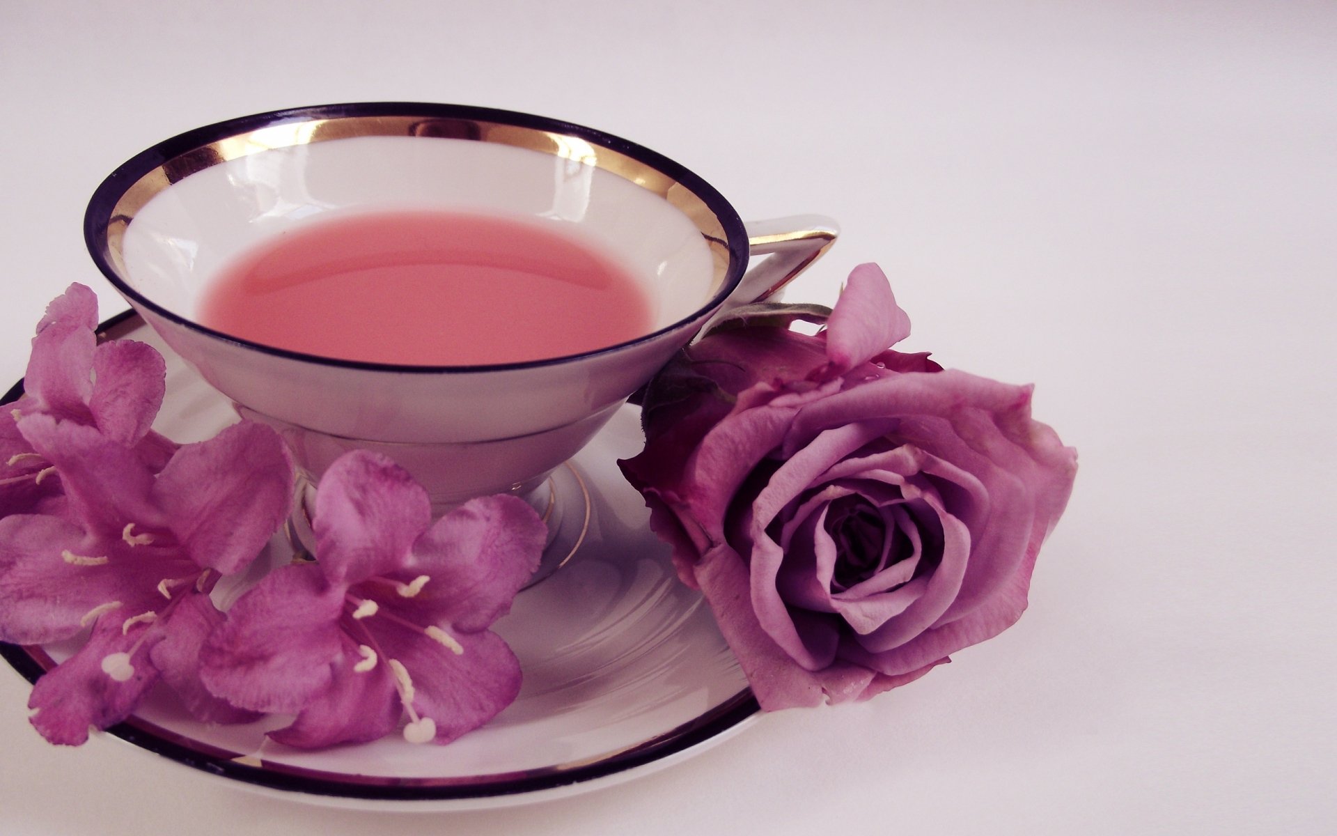 Elegant Tea and Floral Harmony HD Wallpaper