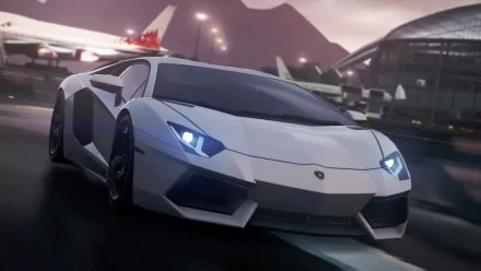 A high-definition desktop wallpaper featuring a sleek white Lamborghini from the video game Need For Speed: Most Wanted, set against a dynamic urban backdrop.