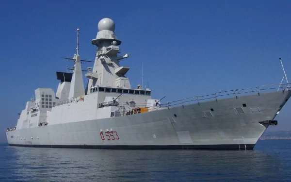 HD desktop wallpaper of Italian Navy destroyer Andrea Doria (D 553) at sea, bow and superstructure visible against a clear blue sky.