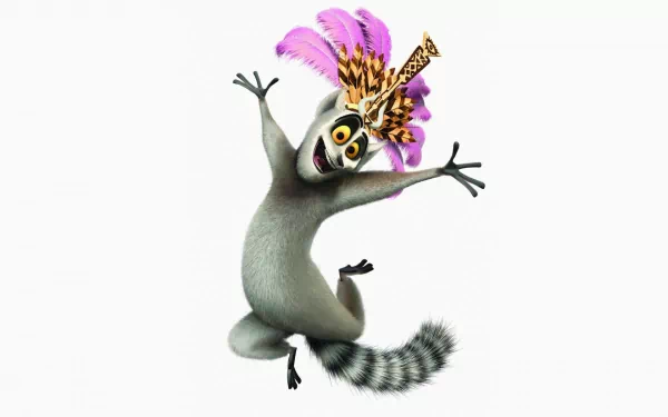 A lively lemur from the movie Madagascar, wearing a feathered crown and joyfully dancing, serves as a vibrant HD PC desktop wallpaper and background.