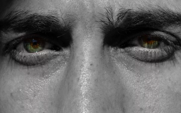 Close-up of a man's eyes in sharp detail, captured in 4K Ultra HD quality, serving as a striking PC desktop wallpaper and background.