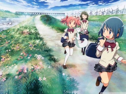 A vibrant scene from Puella Magi Madoka Magica featuring Madoka Kaname, Sayaka Miki, and Hitomi Shizuki walking along a blossoming path, captured in an HD anime wallpaper.