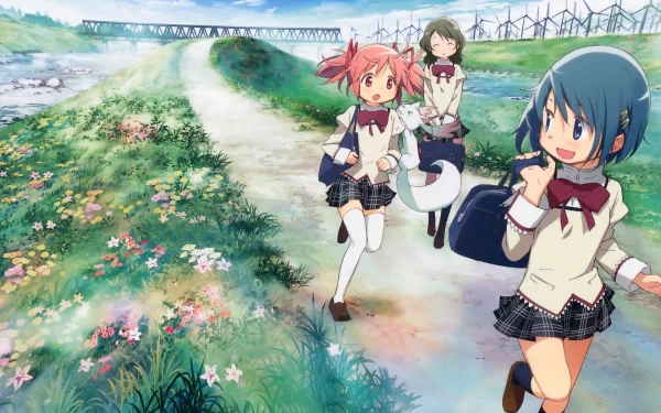 A vibrant scene from Puella Magi Madoka Magica featuring Madoka Kaname, Sayaka Miki, and Hitomi Shizuki walking along a blossoming path, captured in an HD anime wallpaper.