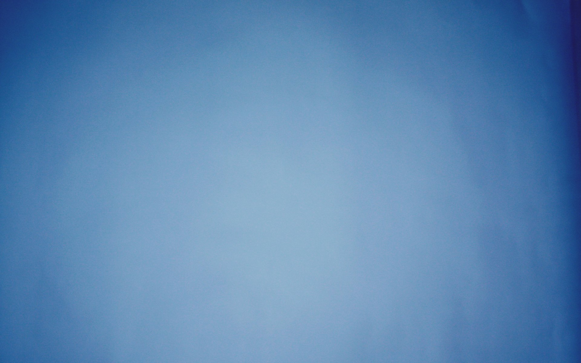 Abstract blue gradient with subtle texture, designed as an HD PC desktop wallpaper and background.