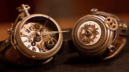 A detailed close-up of two intricate steampunk pocket watches, showcasing ornate gears and vintage clock faces, serves as a captivating sci-fi HD desktop wallpaper.
