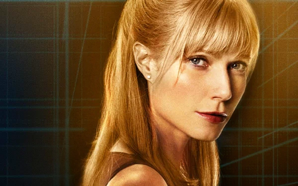 Close-up of Gwyneth Paltrow as Pepper Potts from the movie Iron Man, featuring her striking expression against a sleek, digital background. High-definition desktop wallpaper.