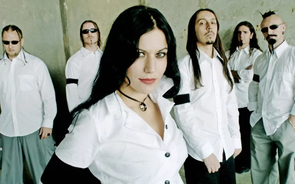 HD PC wallpaper: music band portrait with female lead front and center, five members behind in white shirts against a neutral wall, moody gothic rock aesthetic.