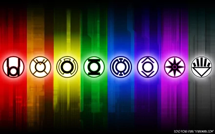 A vibrant HD wallpaper featuring the symbols of the Indigo, Black, Violet, Blue, Yellow, Orange, Red, and Green Lanterns against a colorful background.