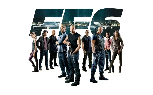 A HD desktop wallpaper and background featuring the cast of Fast & Furious 6 standing in front of a large FF6 logo.