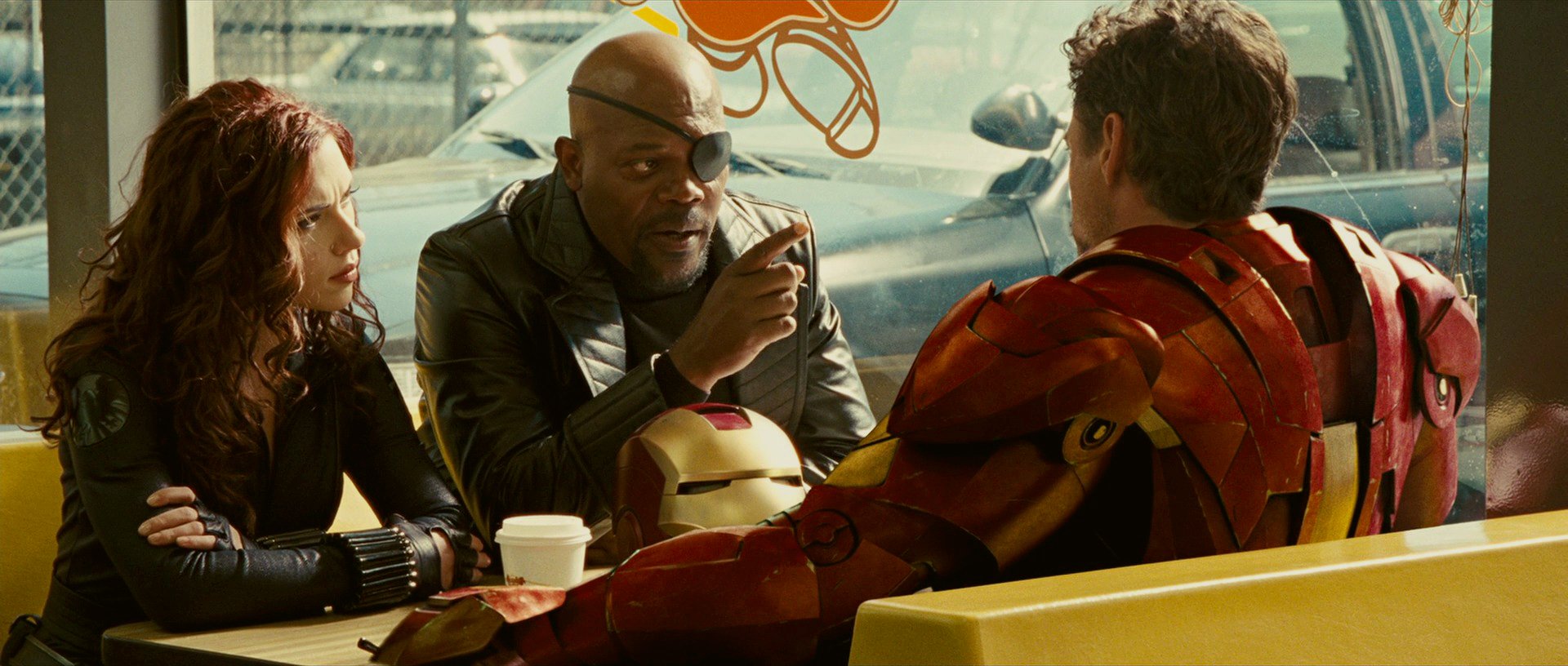 HD PC desktop wallpaper from the movie Iron Man 2 featuring Black Widow, Nick Fury, and Iron Man in a tense conversation.