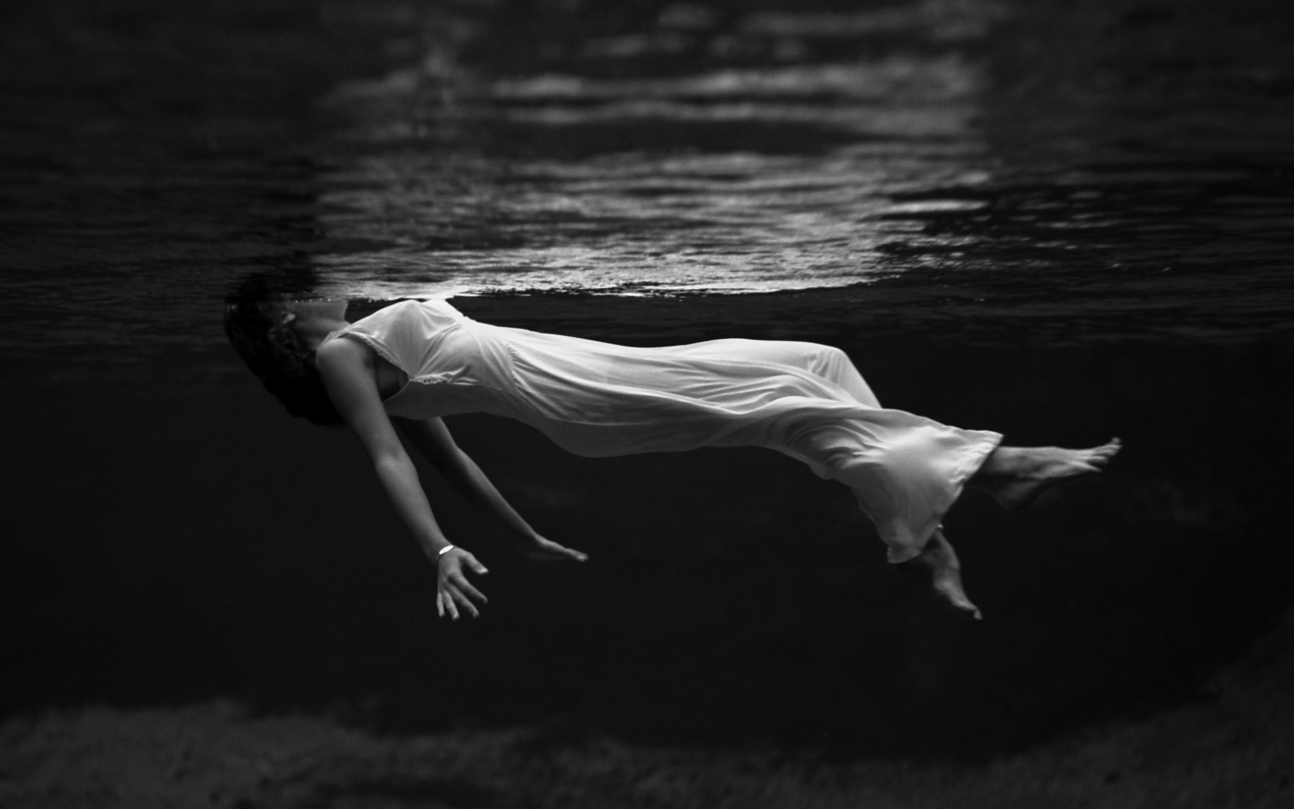 Serene Mood: HD Wallpaper of a Woman Beneath the Water