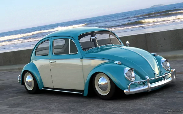 A vintage turquoise and cream Volkswagen Beetle parked by the ocean, showcasing its classic design against a serene beach backdrop. A vibrant HD desktop wallpaper.