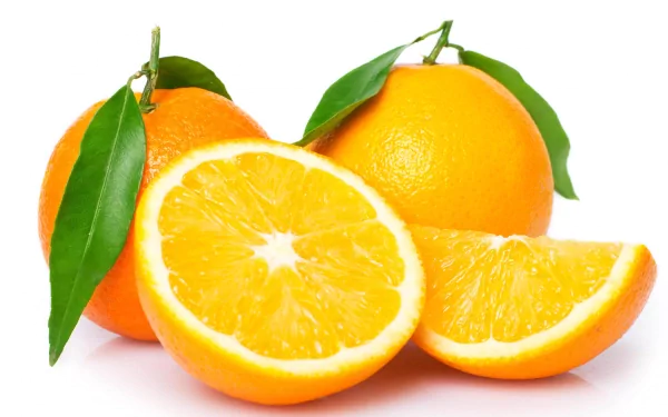 Vibrant orange fruit — whole, halved and sliced with green leaves on a white background. Food-themed 4K Ultra HD PC desktop wallpaper and background.