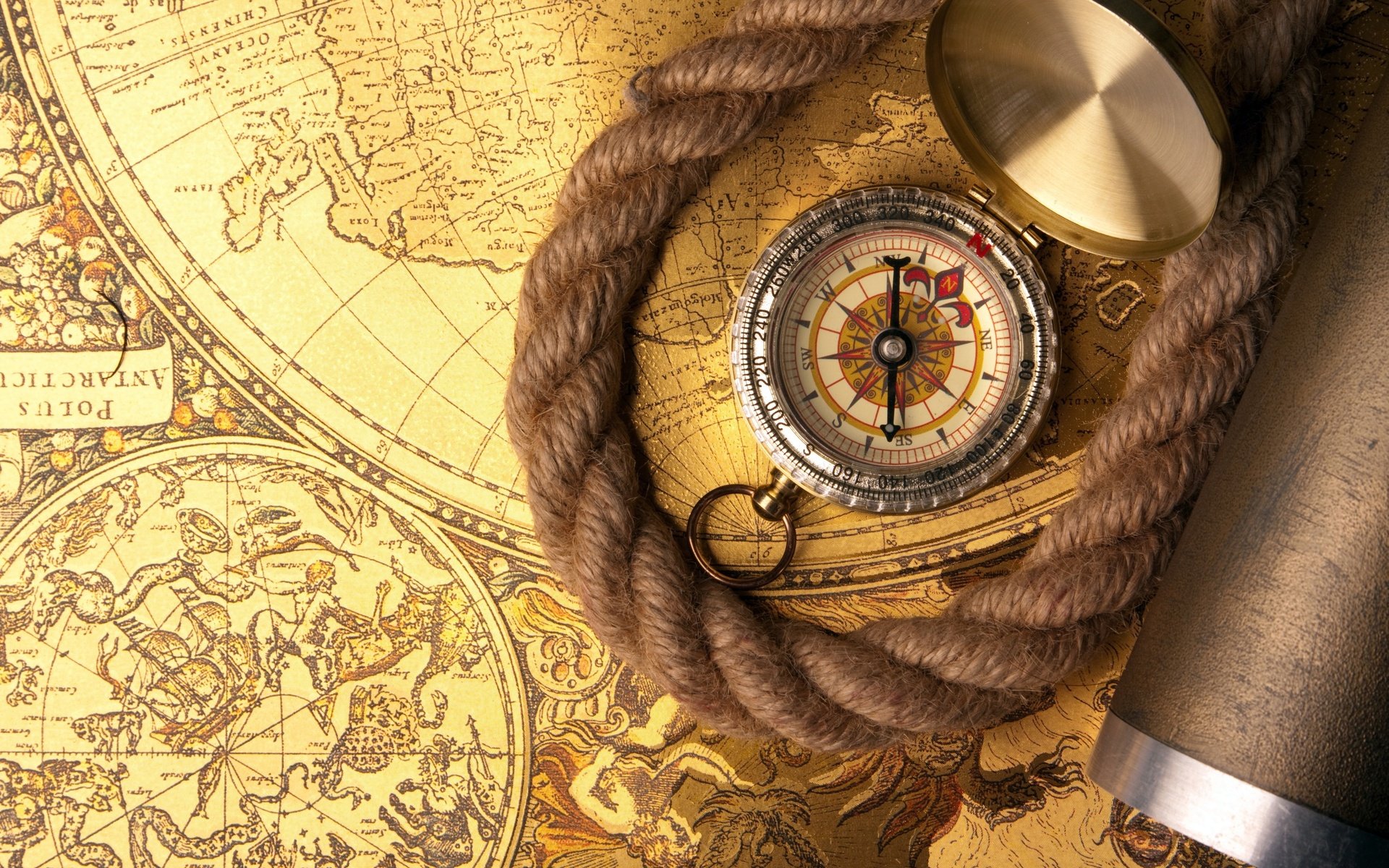 A vintage map background featuring a compass and a rope, creating an adventurous and exploratory theme for a high-definition PC desktop wallpaper.