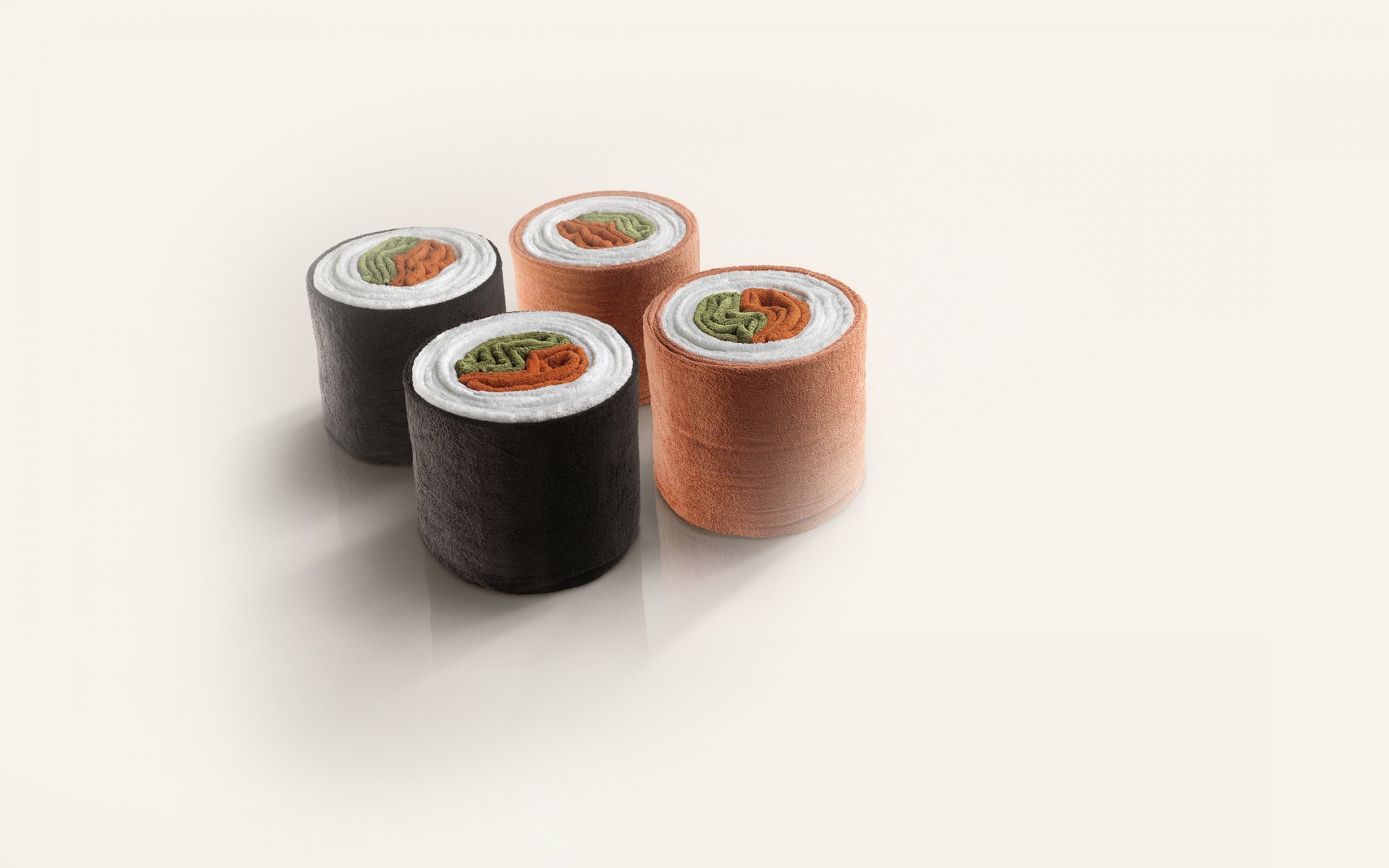Artistic photography of four sushi rolls arranged on a clean, minimal surface, designed as an HD PC desktop wallpaper and background.
