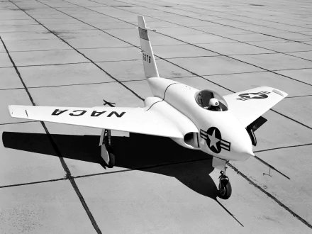 Black-and-white 4K Ultra HD PC desktop wallpaper of a Northrop X-4 Bantam jet with US military markings parked on a tiled flightline.