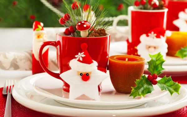 A festive HD Christmas-themed desktop wallpaper featuring red mugs, holiday decorations, and cheerful table settings, evoking a warm holiday spirit.