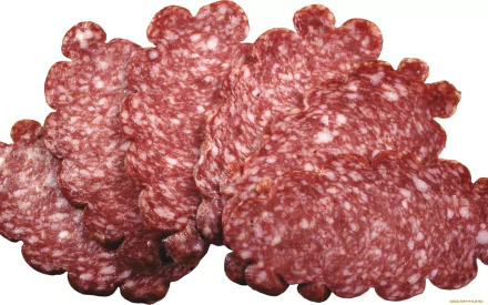 HD PC desktop wallpaper featuring close-up slices of red salami with white fat specks, showcasing detailed texture and rich food colors.