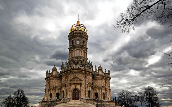 A stunning church with intricate architecture stands against a dramatic sky, making for a captivating HD PC desktop wallpaper and background.