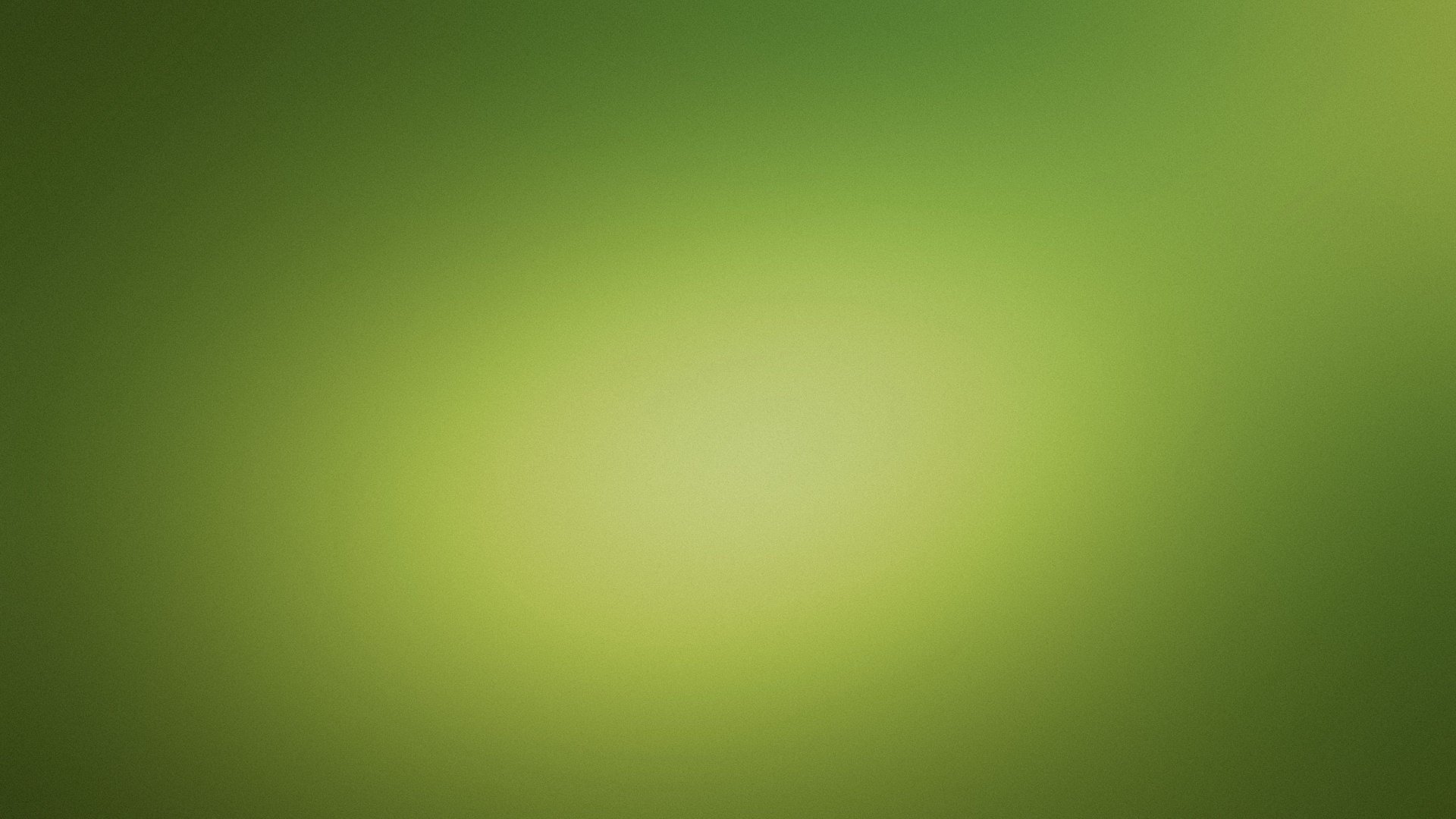 A smooth, abstract green background with soft gradients, creating a calming and vibrant atmosphere. This HD wallpaper adds a refreshing touch to any desktop.