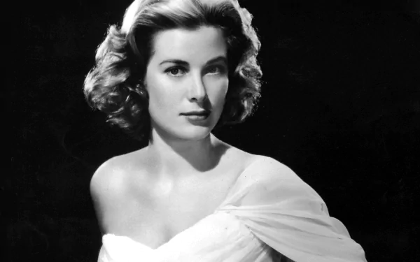 Black-and-white HD desktop wallpaper featuring a classic portrait of celebrity Grace Kelly with elegant styling and soft lighting.